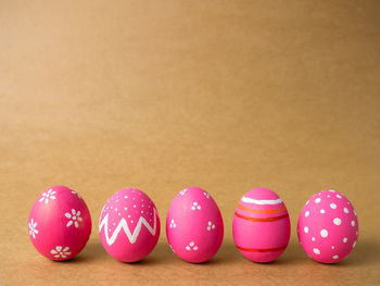 Close-up of multi colored eggs on table