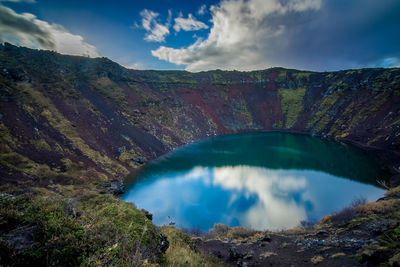 Scenic view of crater lake against sky