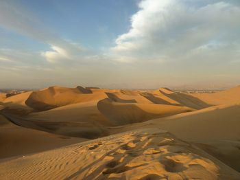 Scenic view of desert against sky