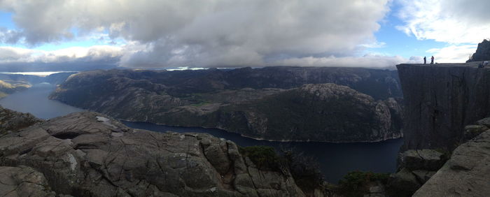 Scenic view of sea against cloudy sky