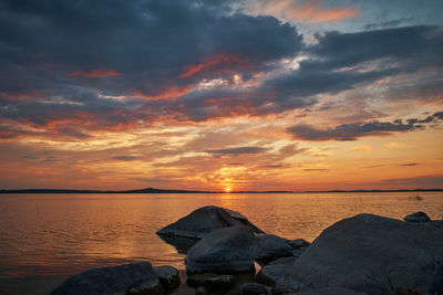 Scenic view of sea against sky during sunset