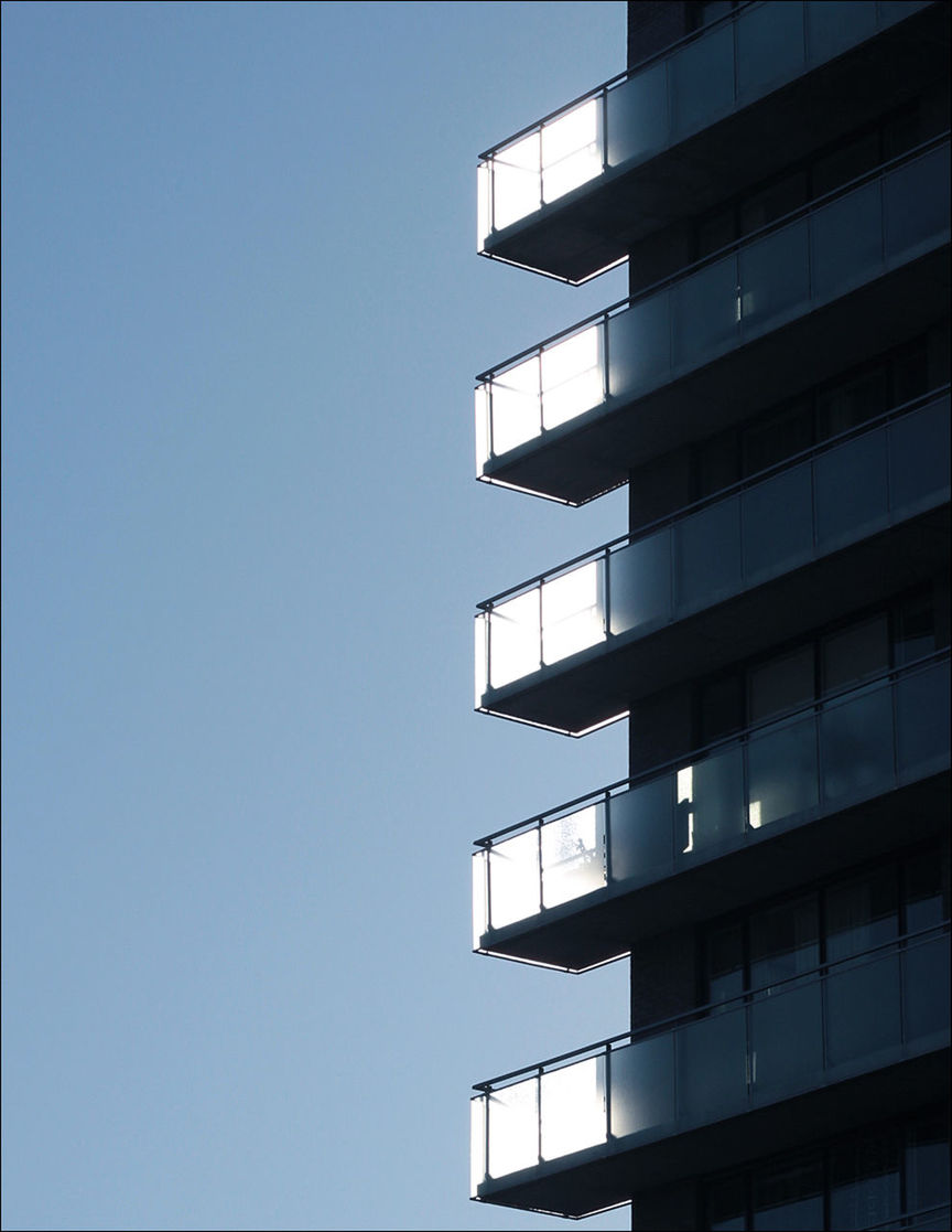 architecture, building exterior, built structure, modern, clear sky, low angle view, copy space, no people, skyscraper, day, window, blue, city, outdoors, corporate business, growth, tall, apartment, sky