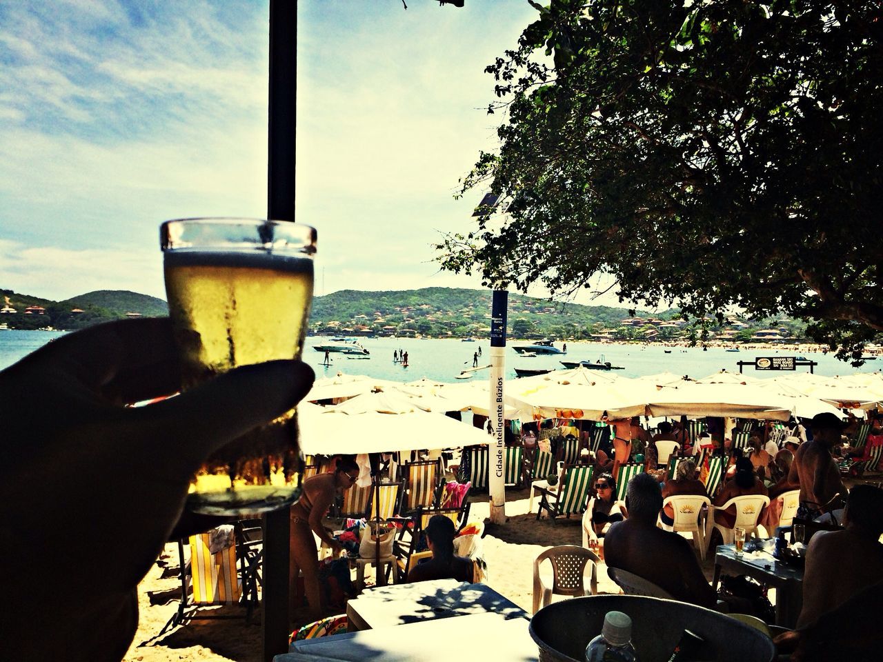 sky, men, lifestyles, drink, part of, food and drink, leisure activity, cropped, person, restaurant, transportation, sea, cloud - sky, table, mode of transport, personal perspective