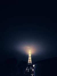 Low angle view of illuminated building at night