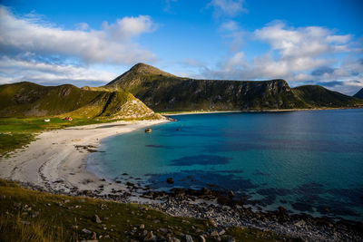 Scenic view of sea and mountains against sky, lofoten, norway