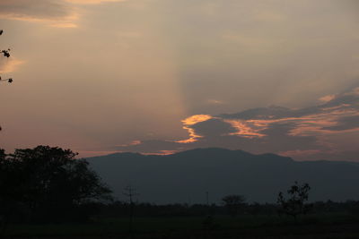 Scenic view of silhouette trees against sky during sunset