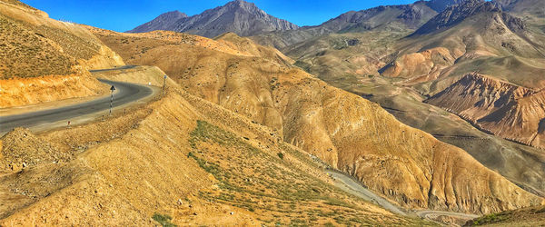 Scenic view of landscape and mountains against sky