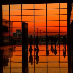 Silhouette of woman at sunset