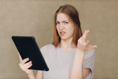 Young woman using mobile phone