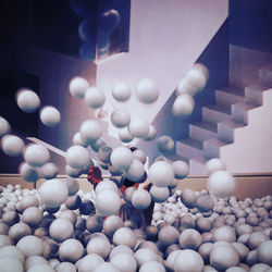 High angle view of balloons on pebbles