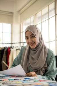 Portrait of a smiling young woman