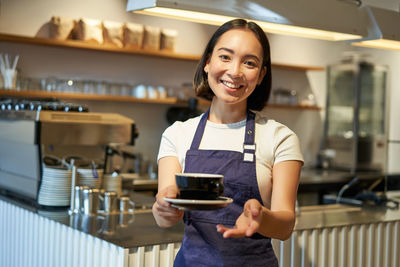 Young woman using mobile phone