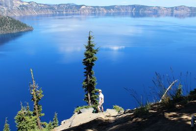 Scenic view of lake against blue sky