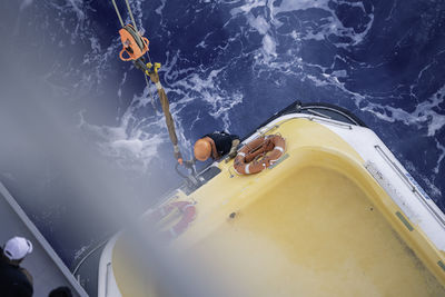 High angle view of man swimming in sea