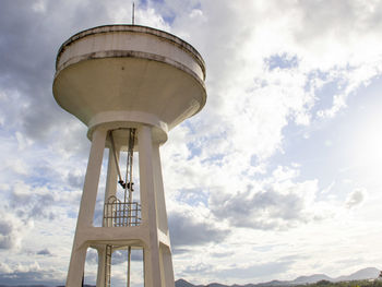 Low angle view of water tower against sky