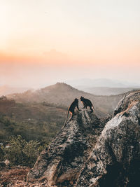 Scenic view of mountains against sky during sunset