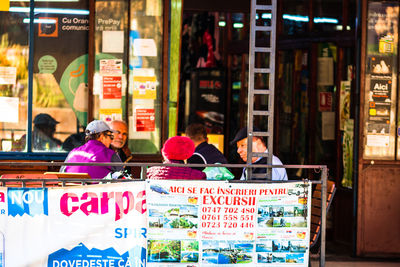 Group of people in store for sale