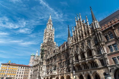 The townhall at the marienplatz in munich, germany, on a sunny day