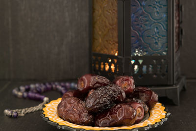 High angle view of dry dates on table