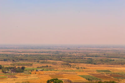 Scenic view of cloudy sky over field