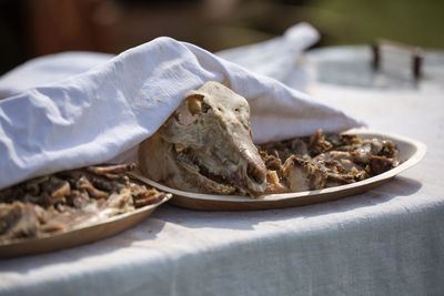 Close-up of fish in plate on table