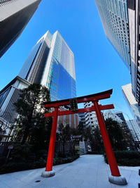 Low angle view of modern buildings against clear sky