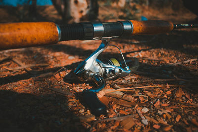 High angle view of fishing rod on land