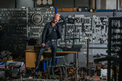 Mechanic standing in workshop