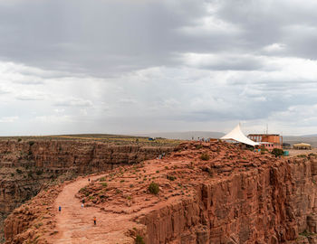 View of landscape against cloudy sky