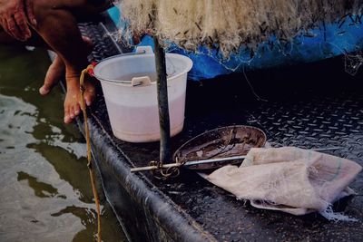 Man working at fish in water