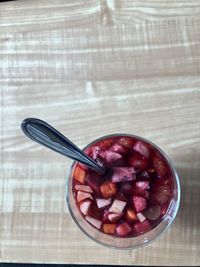 High angle view of strawberries in bowl on table