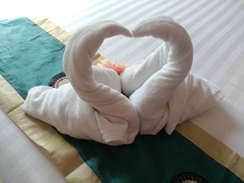 Close-up of heart shape on bed