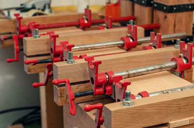 Wooden boards with clips. joinery production. woodworking workshop