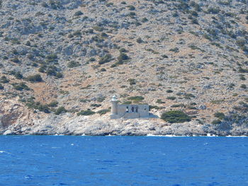 Mid distance view of historic building by sea