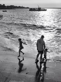People standing on beach