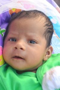 Close-up portrait of cute baby girl