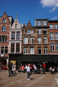 People in front of building