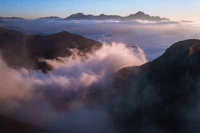 Scenic view of mountains against sky during sunset