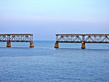 View of bridge over sea against sky