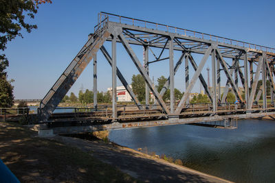 Bridge over river against clear sky