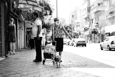 People walking on city street