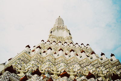 Low angle view of cathedral against cloudy sky