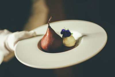 Close-up of strawberries in plate on table