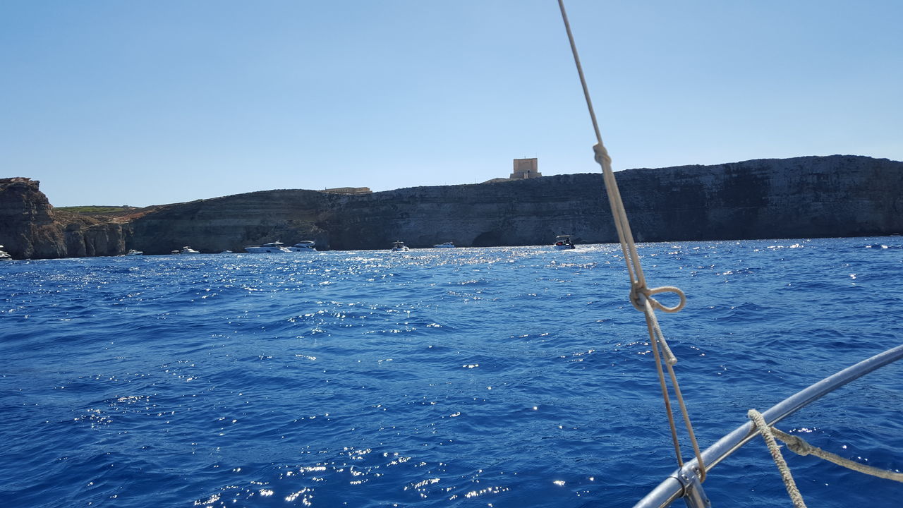 SAILBOAT ON SEA AGAINST CLEAR BLUE SKY