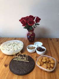 High angle view of roses in vase on table