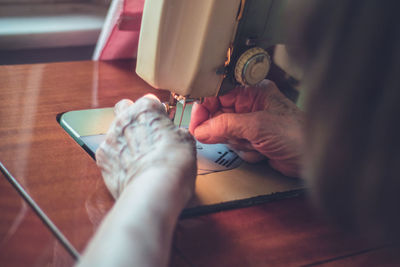 High angle view of man working on table