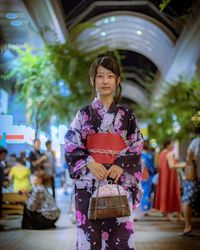 Woman standing in a city