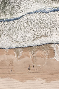 Text on sand at beach