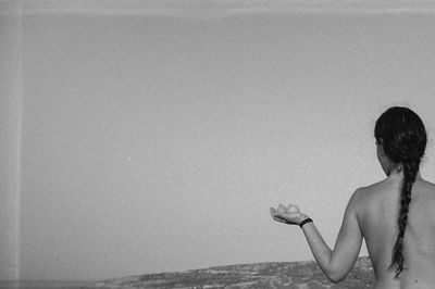 Close-up of woman standing in pond