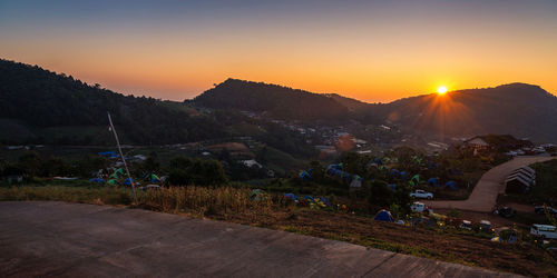 Scenic view of mountains against sky during sunset